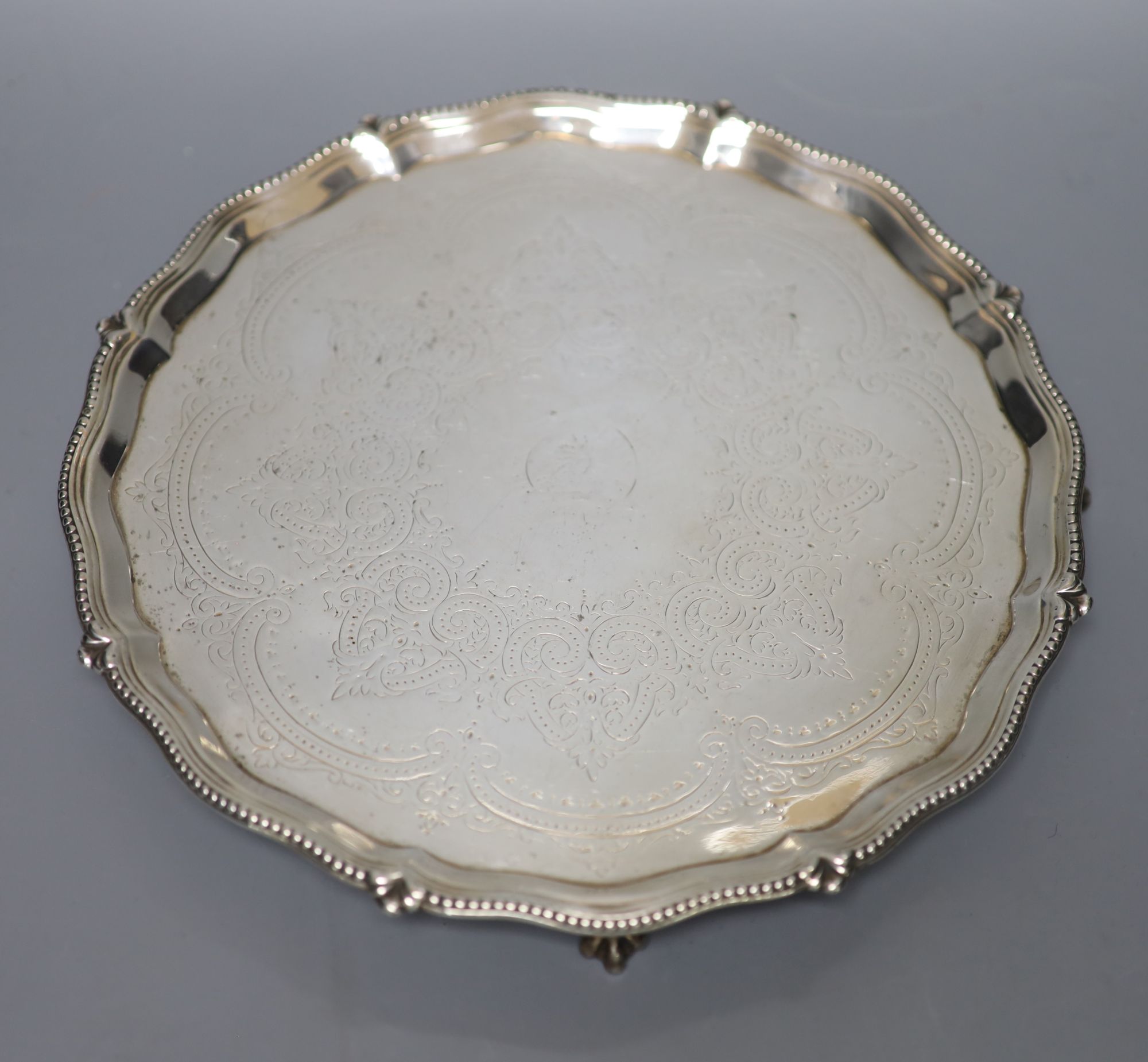 A Victorian engraved silver salver, Thomas Bradbury & Sons, London, 1865, 25.7cm, 16oz.